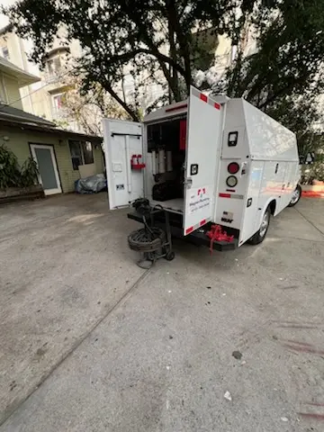 Magnet Plumbing service vehicle on-site for Sewer Line Repair in Medical Center
